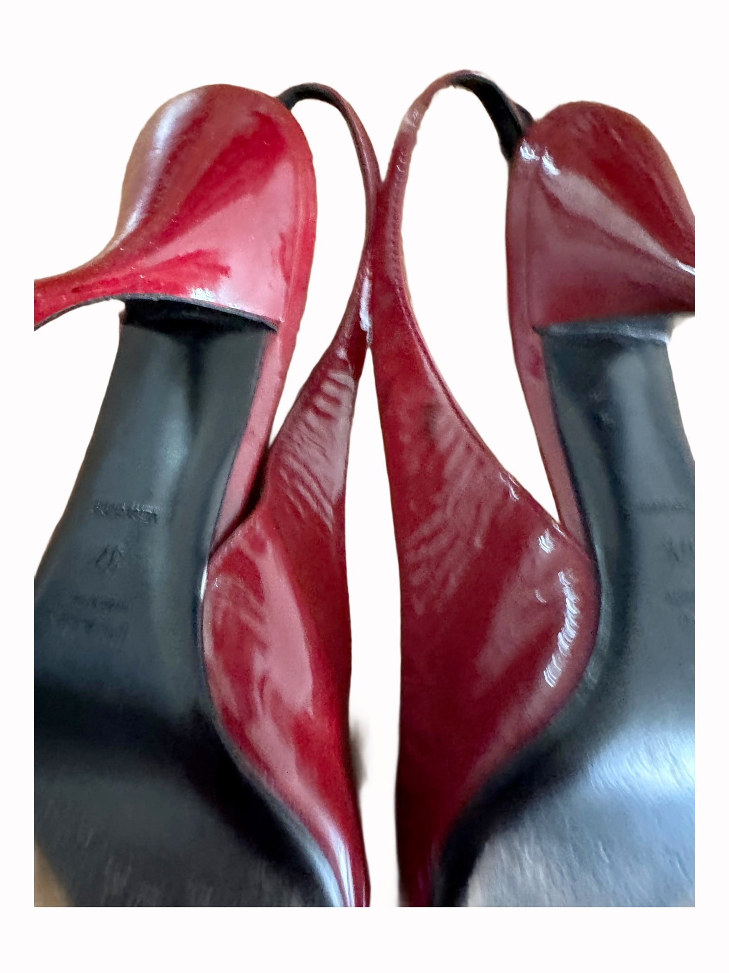 Red patent leather Prada heels