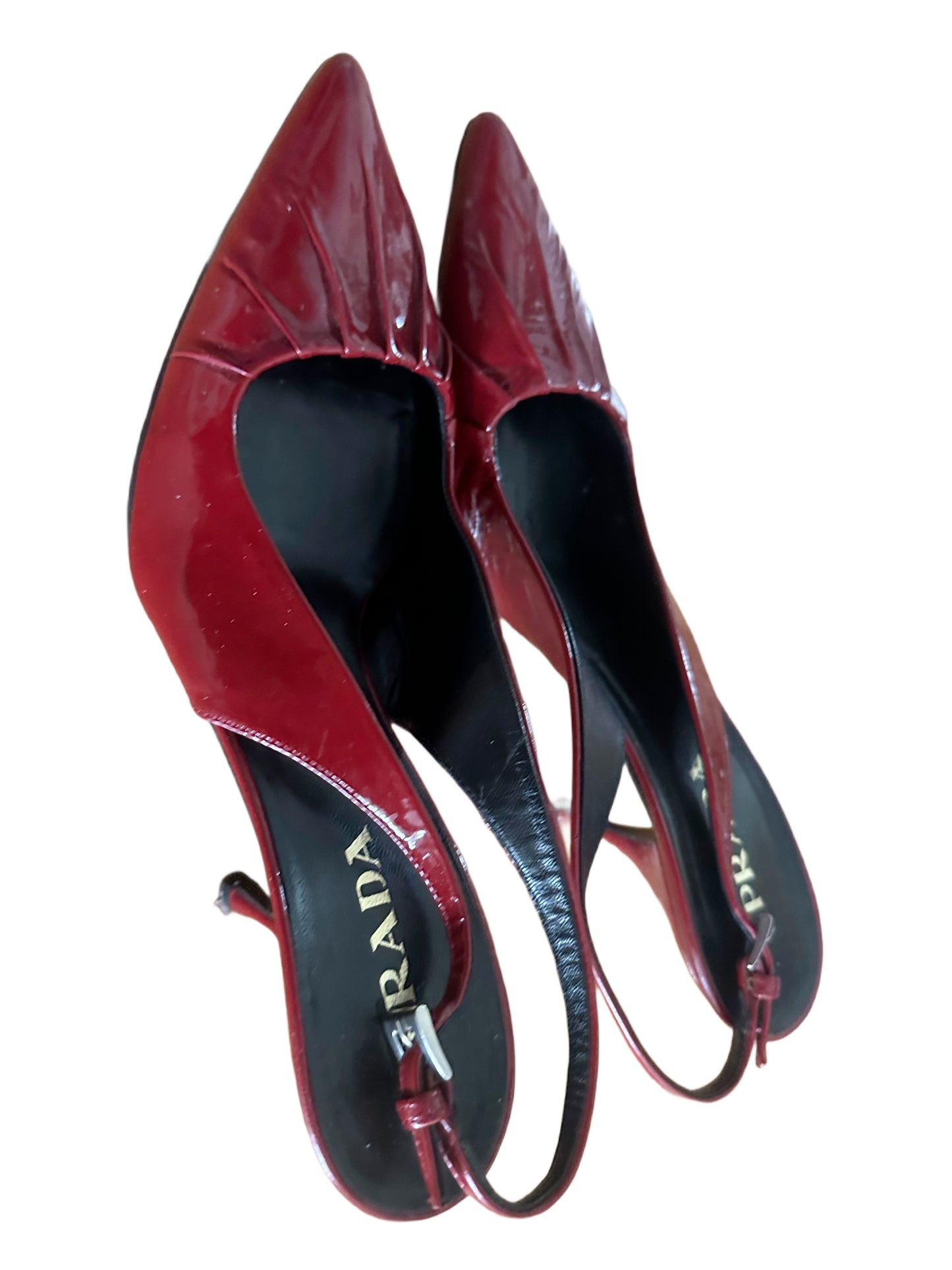 Red patent leather Prada heels