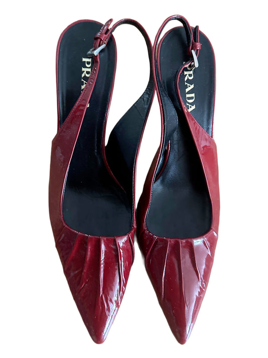 Red patent leather Prada heels